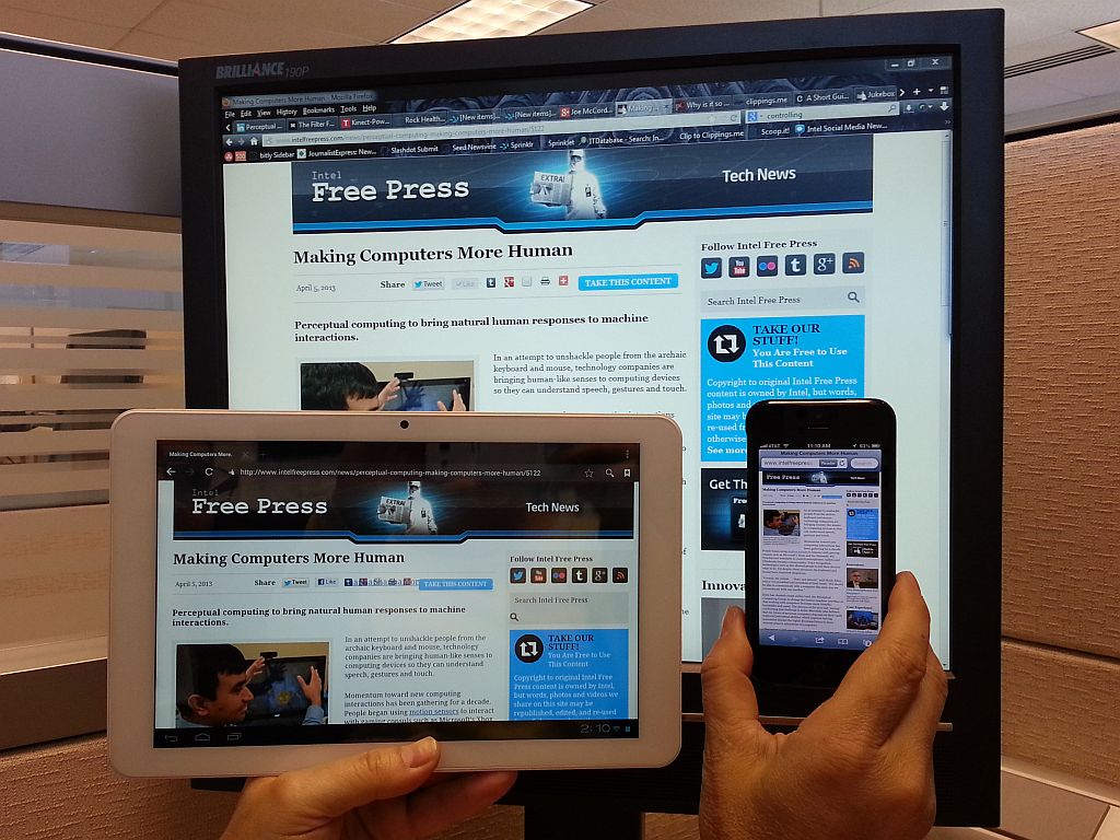 A view of news on a computer, a tablet, and a smart phone